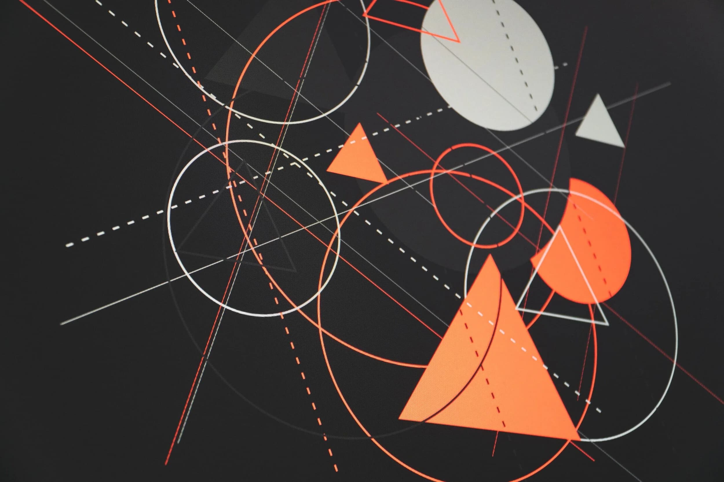 Colourful geometric shapes on a black background as a metaphor for organizational culture.